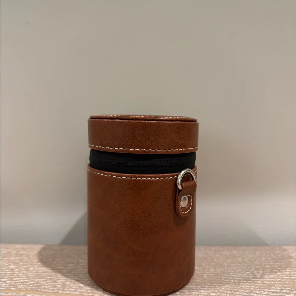 Black Camera Lens with Brown Case